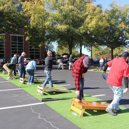 Guys Playing Cornhole